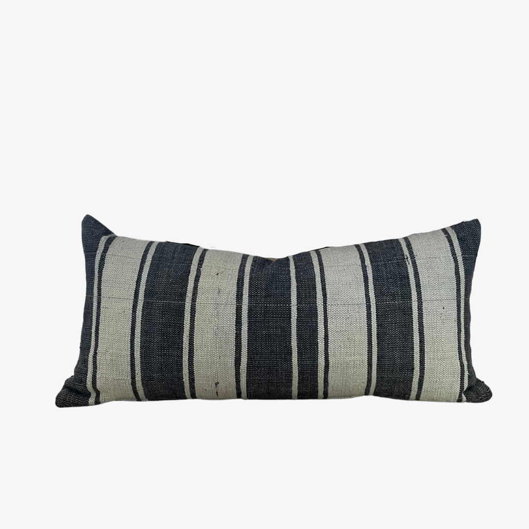 Striped lumbar pillow.