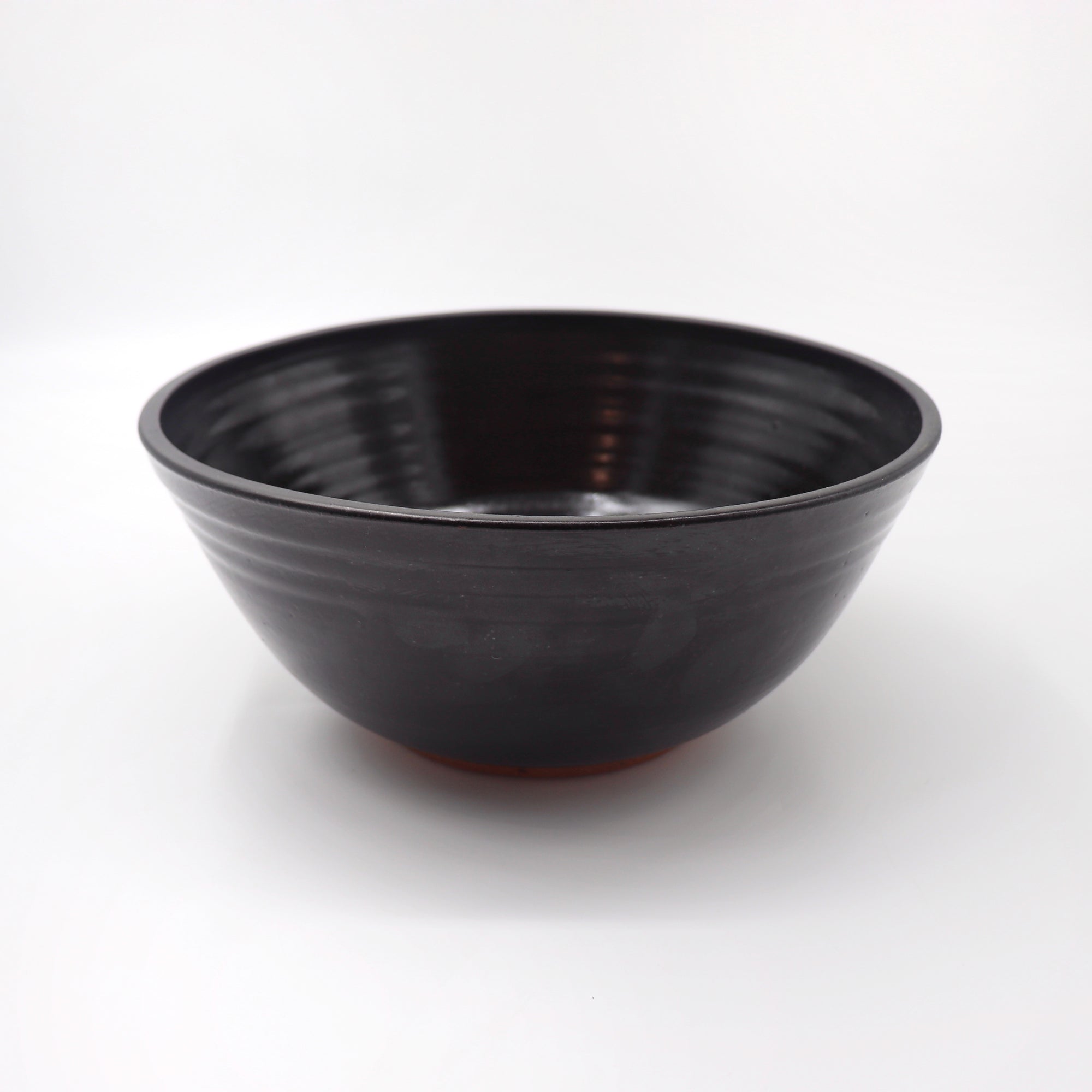 Black serving bowl in matte black.