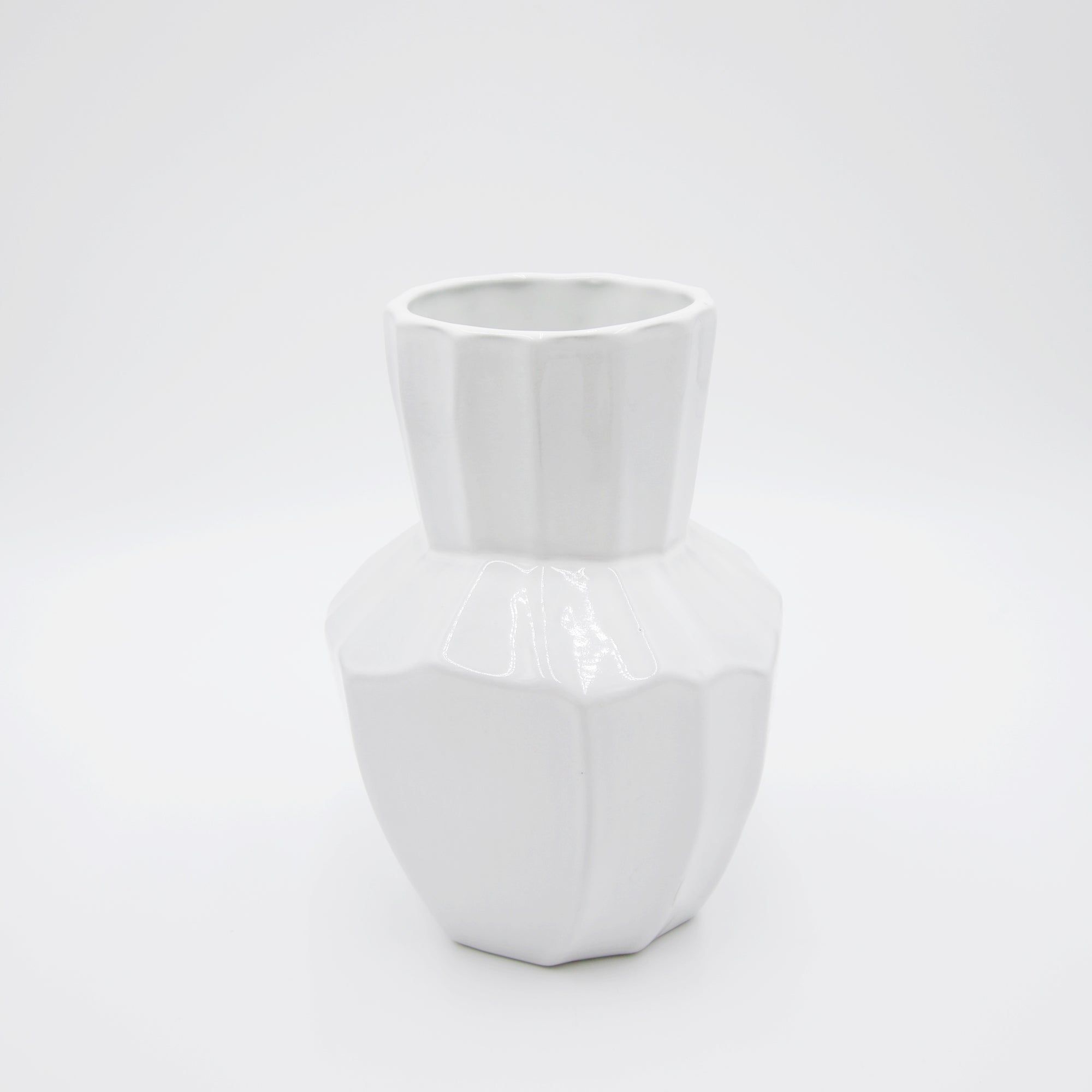 White asymmetric textured glossy vase.