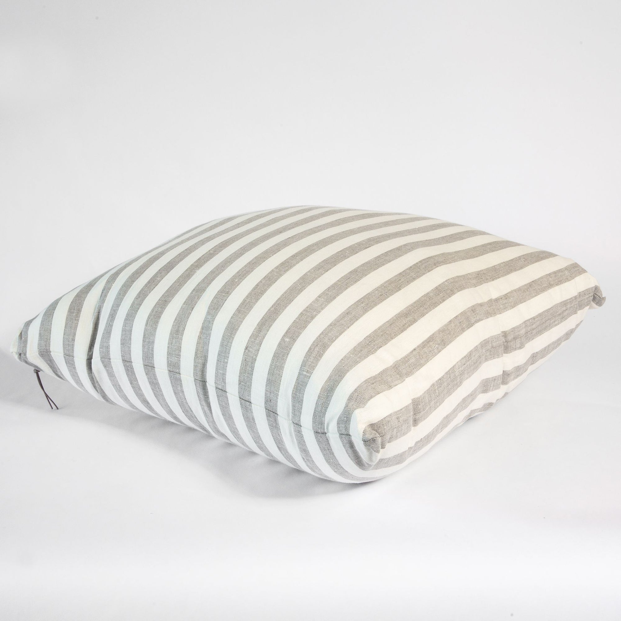 Overside striped linen pillow in grey and white.